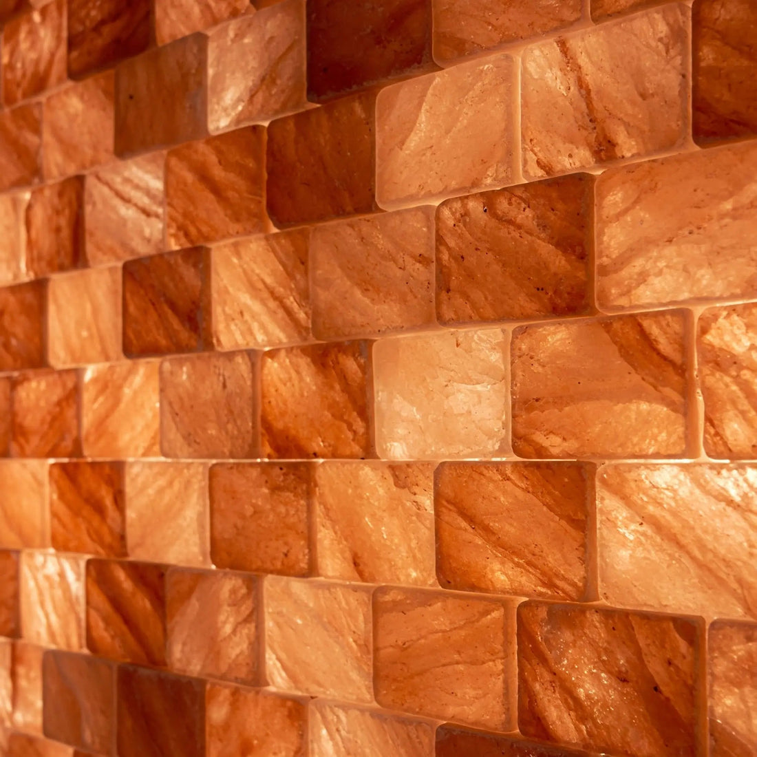 Close-up of pink and amber rectangular salt pieces