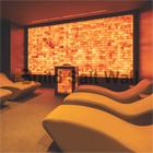 Illuminated Himalayan Salt Cave Relaxation Room with Ergonomic Spa Loungers