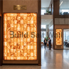 Large Illuminated Himalayan Salt Brick Feature Panel in Modern Office Building Lobby