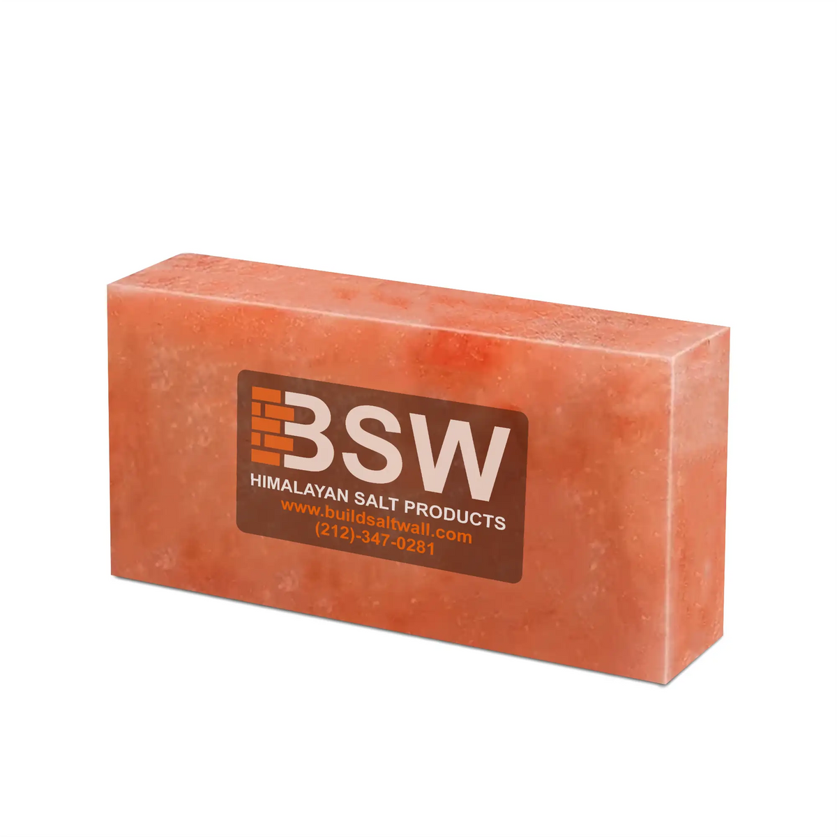 Single Himalayan pink salt brick on a white background
