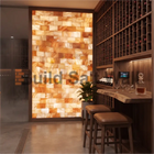 Wine Cellar Tasting Bar Featuring Illuminated Himalayan Pink Salt Brick Accent Wall
