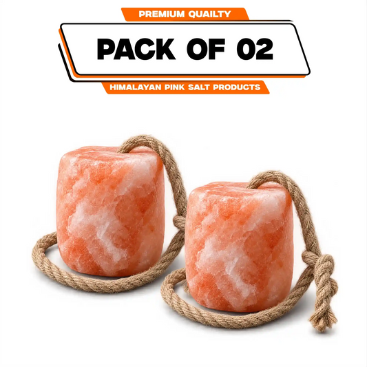 2 pink salt lick blocks with hanging ropes